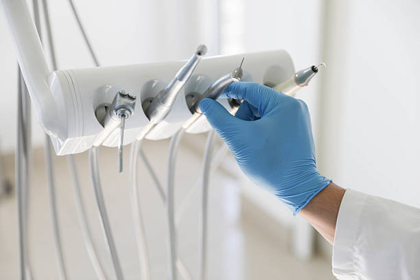 Professional Tooth Extraction technician working in Folly Beach, SC